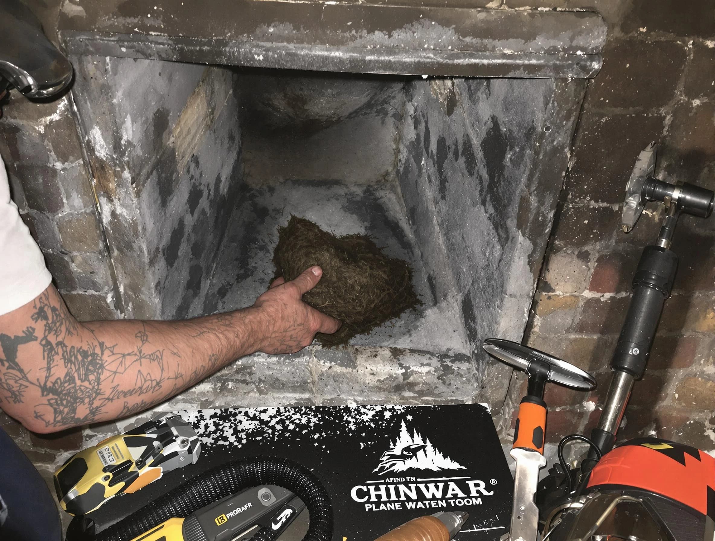 North Valley Chimney Sweep safely removing debris and screening chimney in North Valley, NM